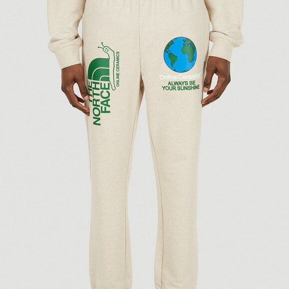 The North Face x Online Ceramics Graphic Track Pants in Beige - Picture 1 of 6